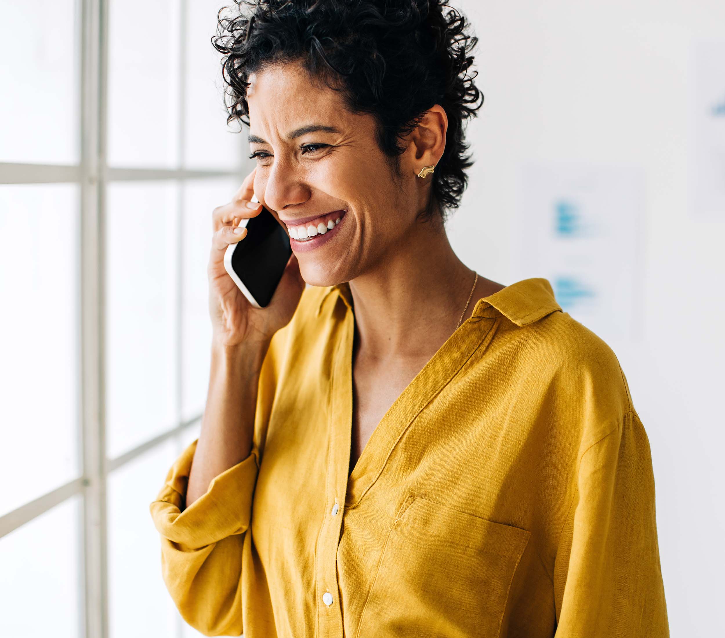 Business,Woman,Takes,A,Phone,Call,In,An,Office.,Professional